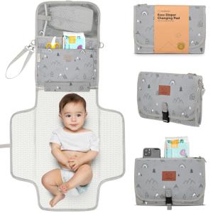 imageKeaBabies Portable Diaper Changing Pad  Large Waterproof Baby Changing Mat Compact Travel Diaper Clutch Functional Pockets Fit Newborn Essentials Wipeable ampamp Padded Baby Changer PrismWoodland
